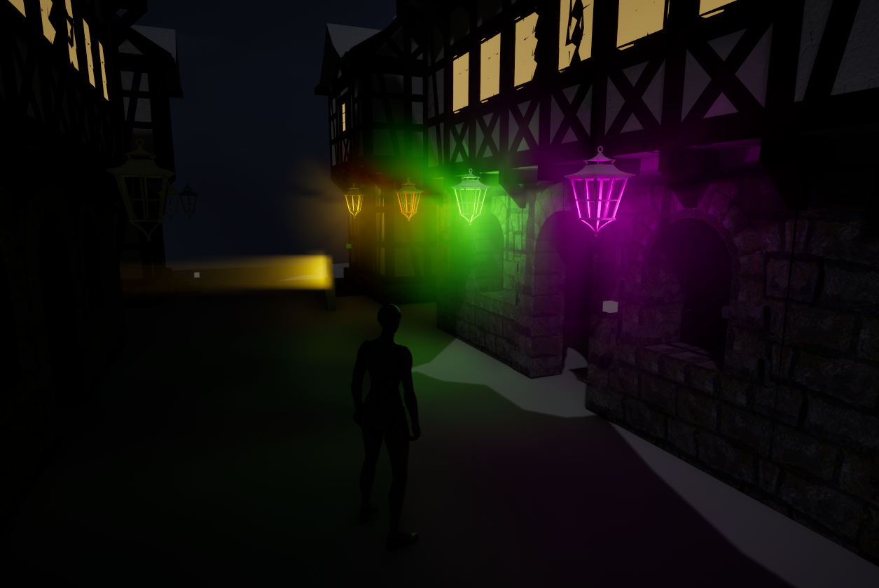Four lanterns casting differently coloured light in a city street